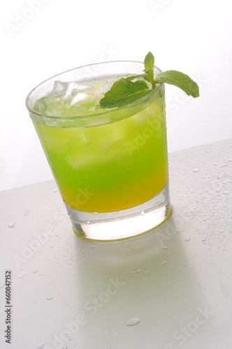 Tropical Sunrise Cocktail Mocktail group shot against a white background with mint photo
