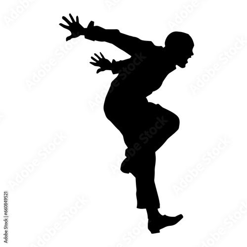 Silhouette of a male dancer in performing pose. Silhouette of a dancing man.