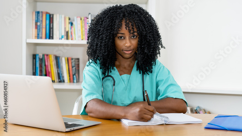 Brazilian female nurse or doctor at work at office