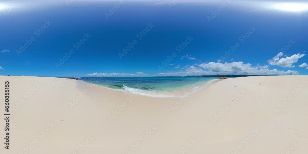 Waves over sandy beach, boat floating over clear ocean water in Naked Island. Surigao del Sur, Philippines. VR 360. Waves over sandy beach, boat floating over clear ocean water in Naked Island. Surigao del Sur, Philippines. VR 360.