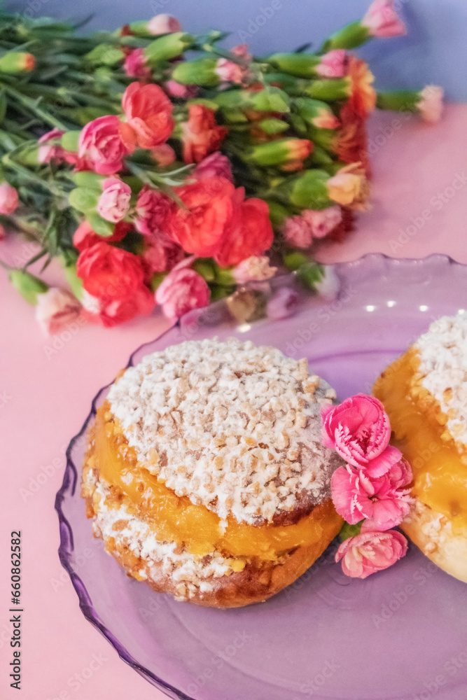 Maritozzo decorated with flowers, advertising layout Maritozzo decorated with flowers, advertising layout