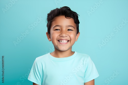 Portrait of a fictional happy little boy smiling. Isolated on a plain background. Generative AI.