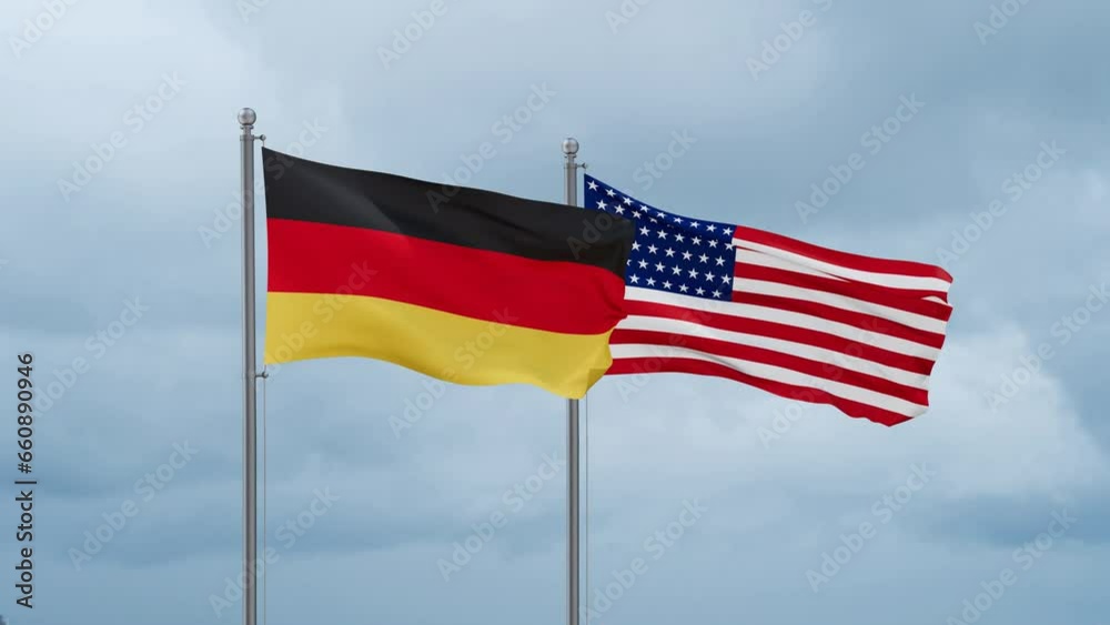 USA and Germany flag waving together on cloudy sky, endless seamless loop, two country cooperation concept USA and Germany flag waving together on cloudy sky, endless seamless loop, two country cooperation concept
