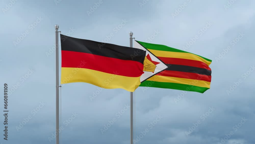 Zimbabwe and Germany flag waving together on cloudy sky, endless seamless loop, two country cooperation concept Zimbabwe and Germany flag waving together on cloudy sky, endless seamless loop, two country cooperation concept