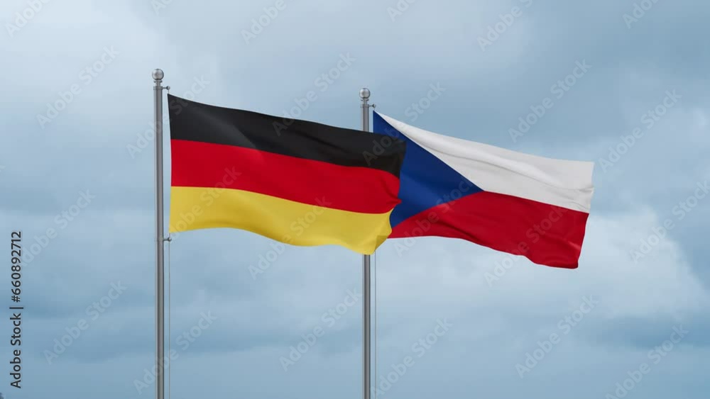 Czech Republic flag and Germany flag waving together on cloudy sky, endless seamless loop, two country relations concept Czech Republic flag and Germany flag waving together on cloudy sky, endless seamless loop, two country relations concept