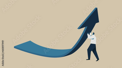 Businessman holding up an arrow.