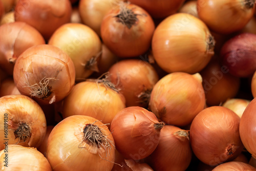 Onions in farmer's market. A group of onion. Vegetable concept idea. Selective Focus.