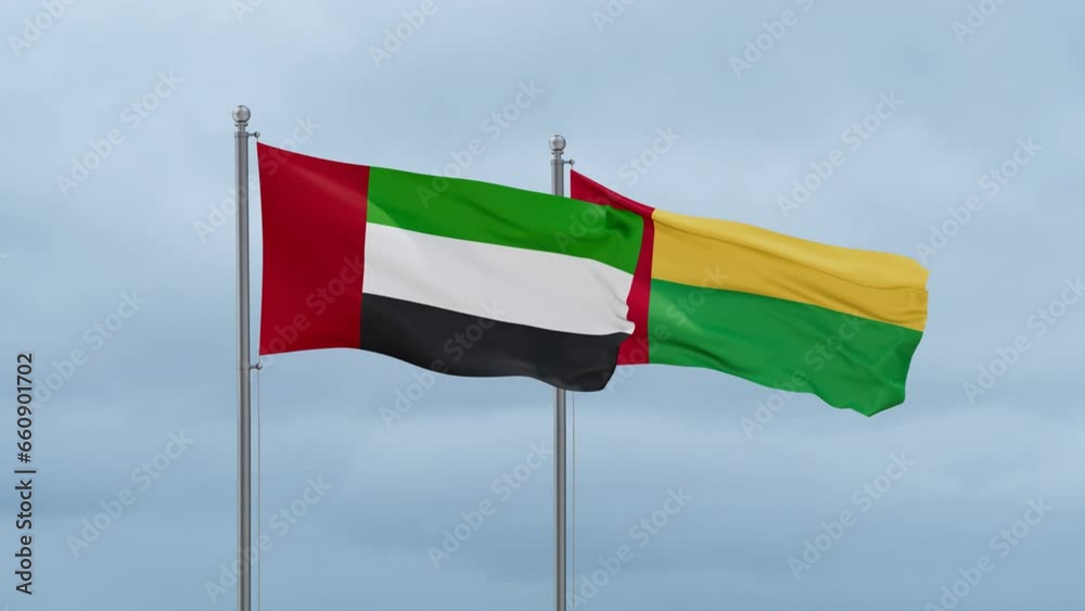 Guinea-Bissau flag and United Arab Emirates UAE flag waving together on cloudy sky, endless seamless loop, two country relations concept Guinea-Bissau flag and United Arab Emirates UAE flag waving together on cloudy sky, endless seamless loop, two country relations concept