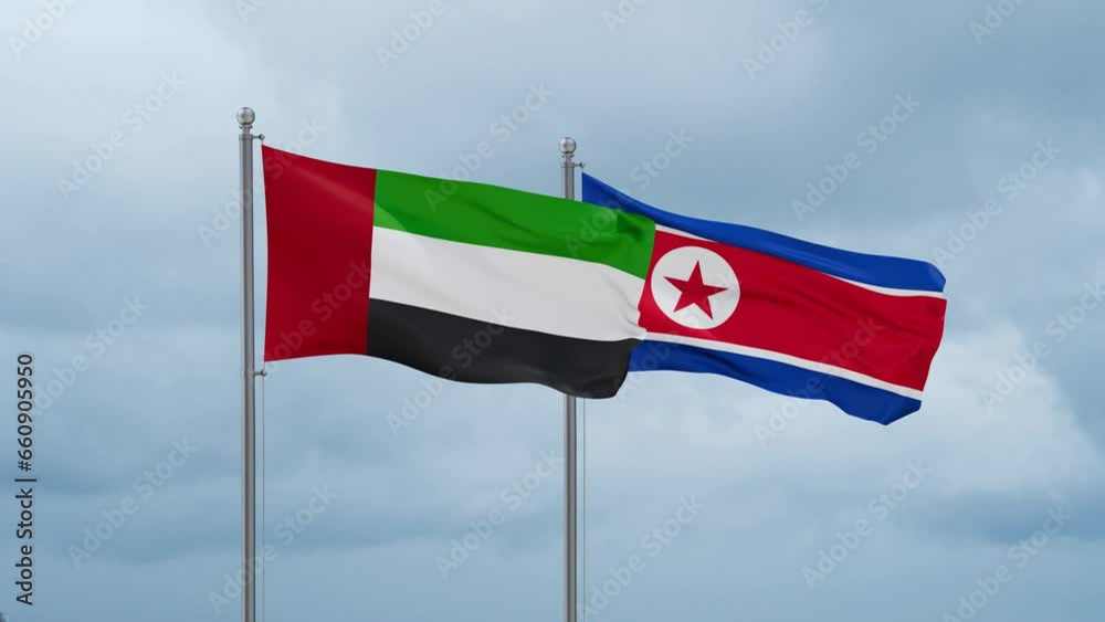 North Korea and United Arab Emirates UAE flag waving together on cloudy sky, endless seamless loop North Korea and United Arab Emirates UAE flag waving together on cloudy sky, endless seamless loop