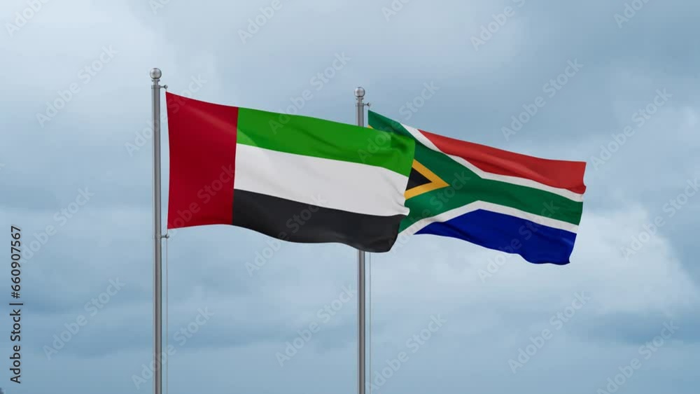 Republic of South Africa and United Arab Emirates UAE flag waving together on cloudy sky, endless seamless loop, two country cooperation concept Republic of South Africa and United Arab Emirates UAE flag waving together on cloudy sky, endless seamless loop, two country cooperation concept