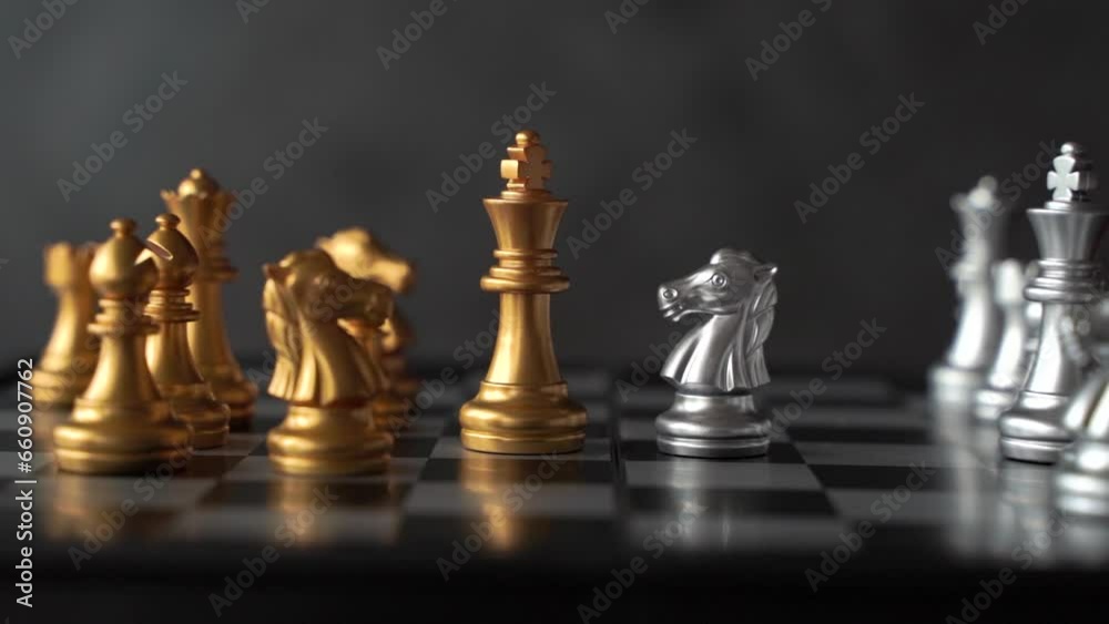 Concept of leadership. Golden chess king faces horse knight on board on white background. Abstract image showing business leadership with camera panning to the right.
Concept of leadership. Golden chess king faces horse knight on board on white background. Abstract image showing business leadership with camera panning to the right.