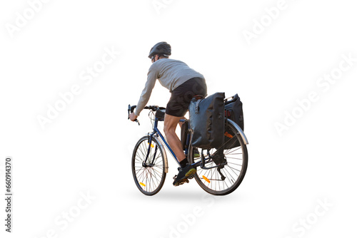 Cyclist on a bicycle with panniers riding along