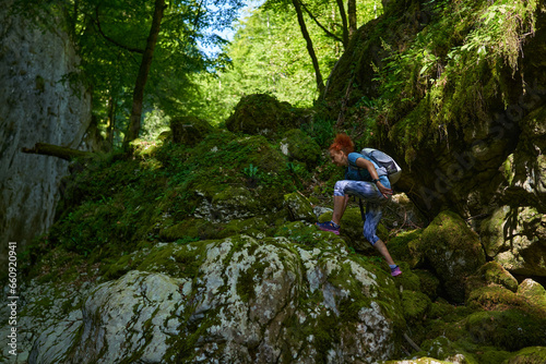 Woman hiker exploring a canyon