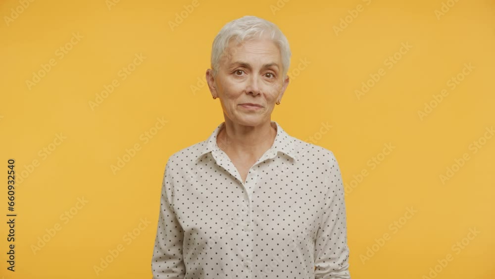 Senior Woman Shrugging Shoulders Saying I Don't Know Gesture Senior Woman Shrugging Shoulders Saying I Don't Know Gesture