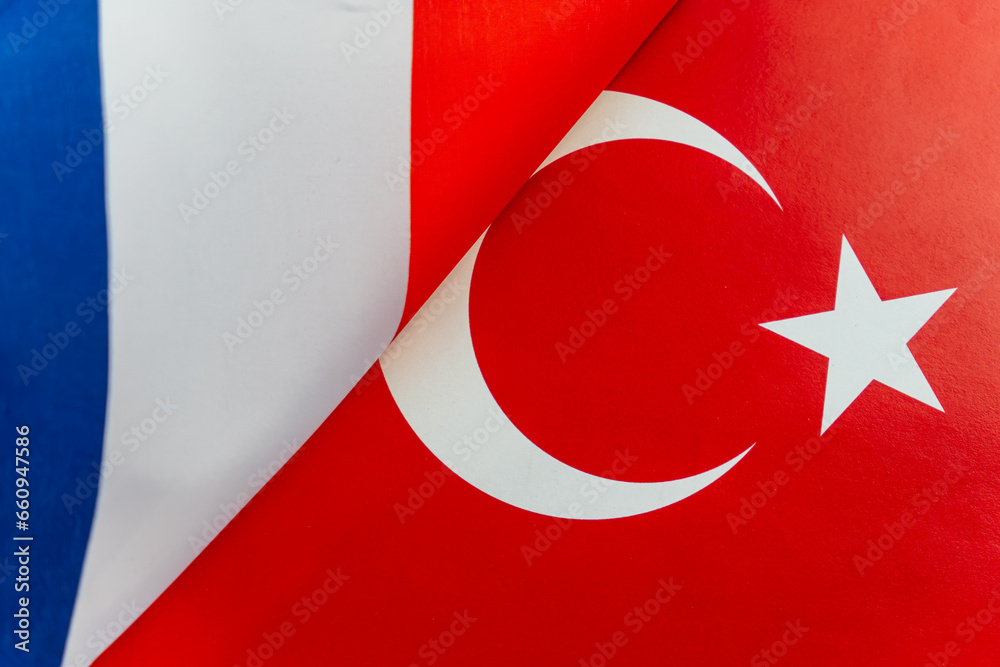 Flags of france, Turkey. The concept of international relations between countries. The concept of an alliance or a confrontation between two state governments. Friendship of peoples.