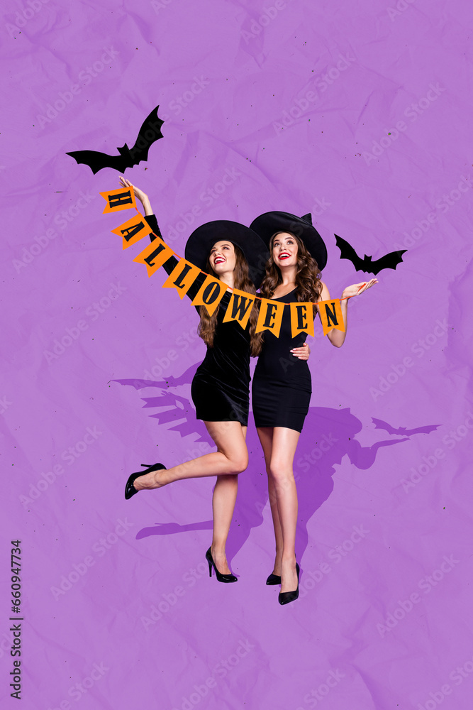 Vertical collage image of two stunning cheerful sorcerer girls embrace hold halloween flags flying bats isolated on paper violet background