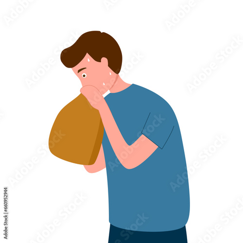Nervous man breathing in paper bag trying to calm down. Panic attack. Mental stress.