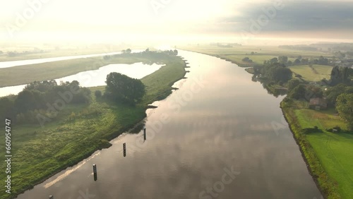 Aerial view over the IJsseldelta and the river IJssel during a summer sunrise near Zwolle and Hattem in Overijssel and Gelderland Netherlands. photo