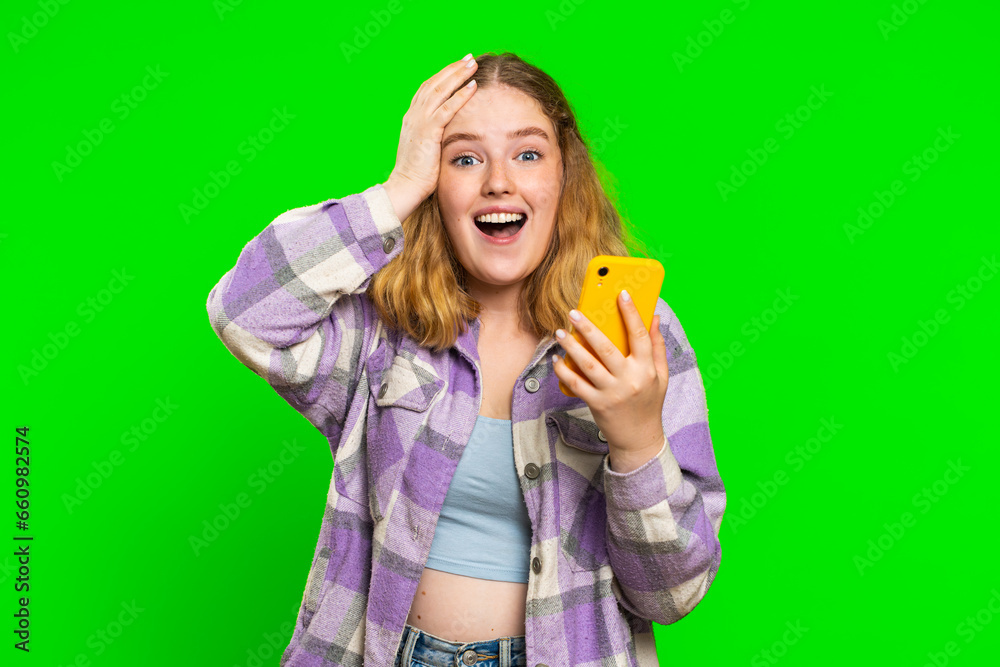 Happy excited woman girl use smartphone typing browsing shouting say wow yes found out great big win good news lottery goal achievemen celebrating success, winning play game on chroma key background Happy excited woman girl use smartphone typing browsing shouting say wow yes found out great big win good news lottery goal achievemen celebrating success, winning play game on chroma key background