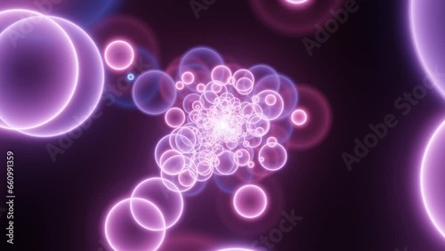 Shiny neon circles in abstract pattern on a black background. Dynamic multicolor rings with bright neon effect. Modern animation with neon glowing elements (ID: 660991359)