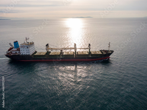 Aerial view of freight ship with cargo containers. © FATIR29