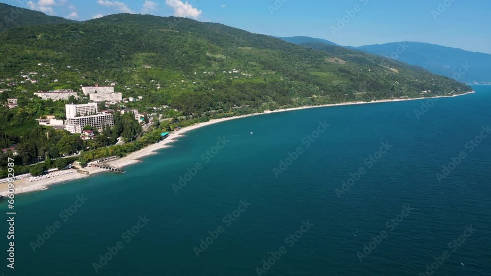 Aerial view of beautiful summer landscape with sea and mountains. Coastline of the Black Sea with white beaches. Aerial view of beautiful summer landscape with sea and mountains. Coastline of the Black Sea with white beaches.