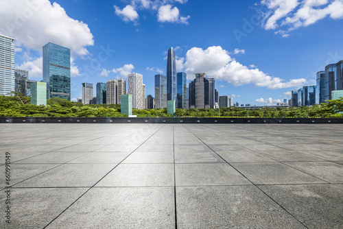 Empty square floor and skyline with modern buildings background