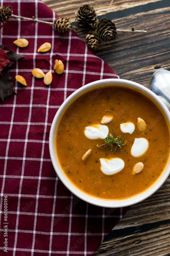 pumpkin soup. on a wooden background. gourmet. lunch .season