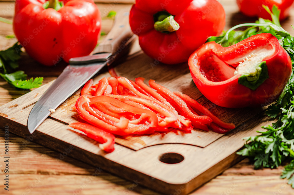Chopped sweet pepper. On wooden table. Chopped sweet pepper. On wooden table.