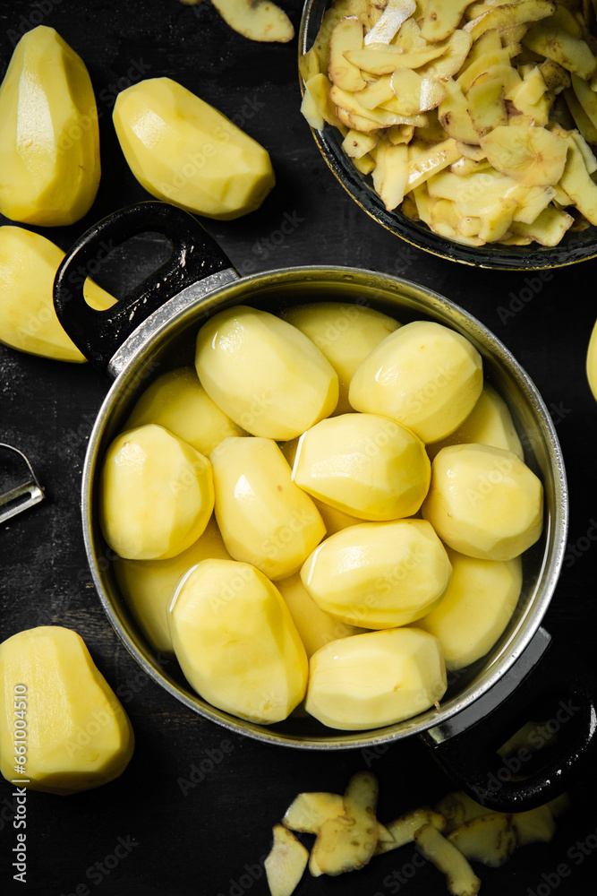 Fresh peeled potatoes. Fresh peeled potatoes.
