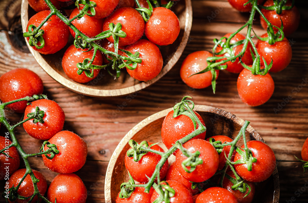 Fresh tomatoes. On wooden table. Fresh tomatoes. On wooden table.