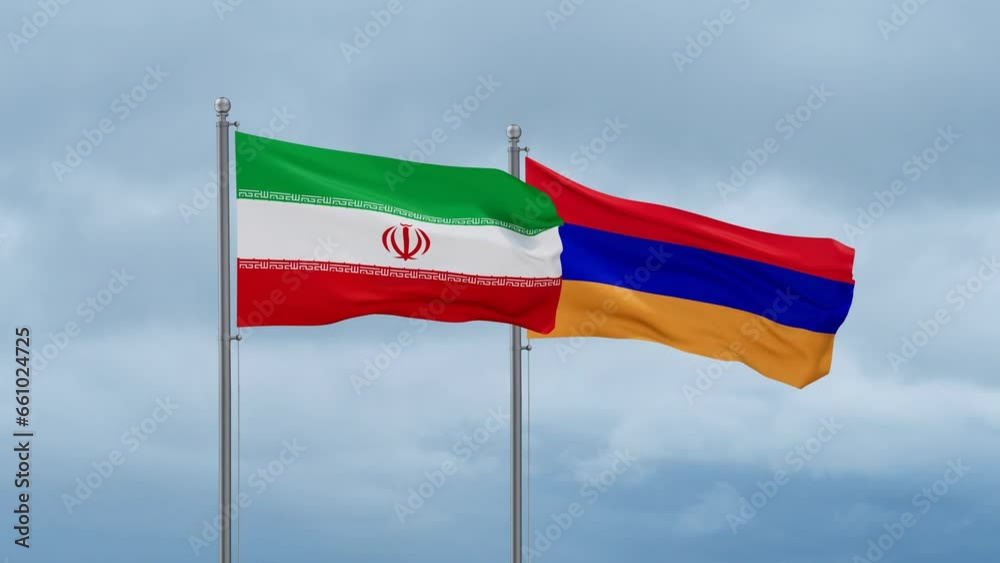 Armenia and Iran flag waving together on cloudy sky, endless seamless loop, two country cooperation concept Armenia and Iran flag waving together on cloudy sky, endless seamless loop, two country cooperation concept