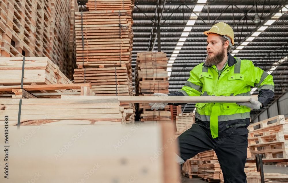 Fototapeta premium Determined woodworker measures, shapes, and balances wood with precision using hand and power tools