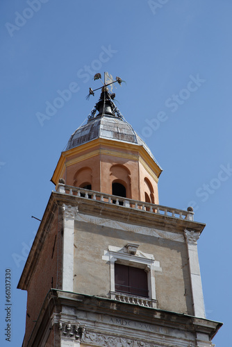 Modena, Italy. View of Cathedral with Ghirlandina tower located on Piazza Grande at dusk