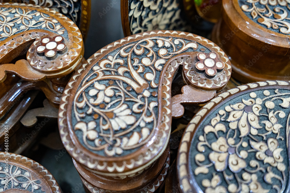 A beautiful peacock-shaped box containing women's items is displayed for sale in the shop A beautiful peacock-shaped box containing women's items is displayed for sale in the shop