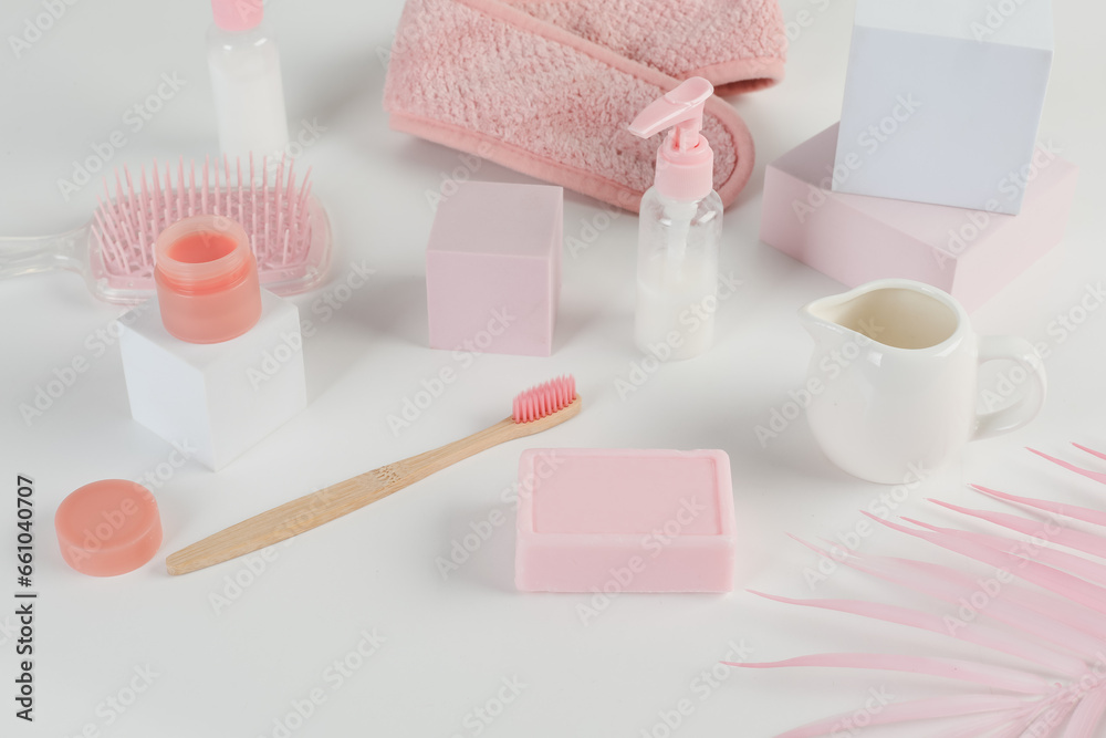 Skincare routine. Pink Women skincare products on white background. Soap, facial foam, cleansing, serum, cream lotion, lipstick. Beauty concept. Natural cosmetic pink flat lay top view Skincare routine. Pink Women skincare products on white background. Soap, facial foam, cleansing, serum, cream lotion, lipstick. Beauty concept. Natural cosmetic pink flat lay top view