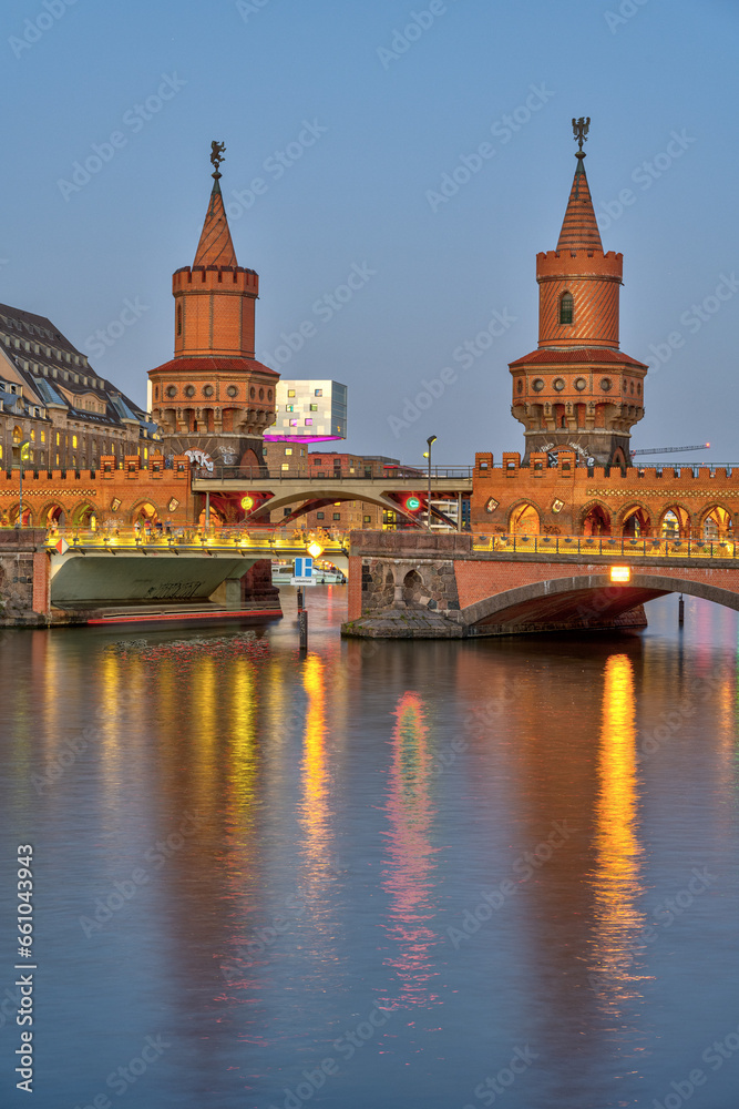 The towers of the beautiful Oberrbaumbruecke in Berlin at twilight