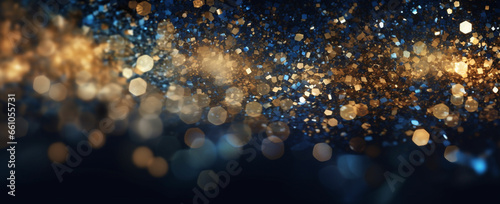 Soft-focus banner of blue, gold, and black abstract glitter lights