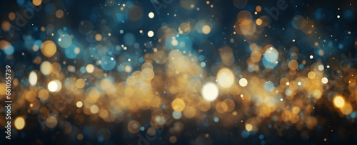 Abstract glitter lights banner in blue, gold, and black, with a soft focus