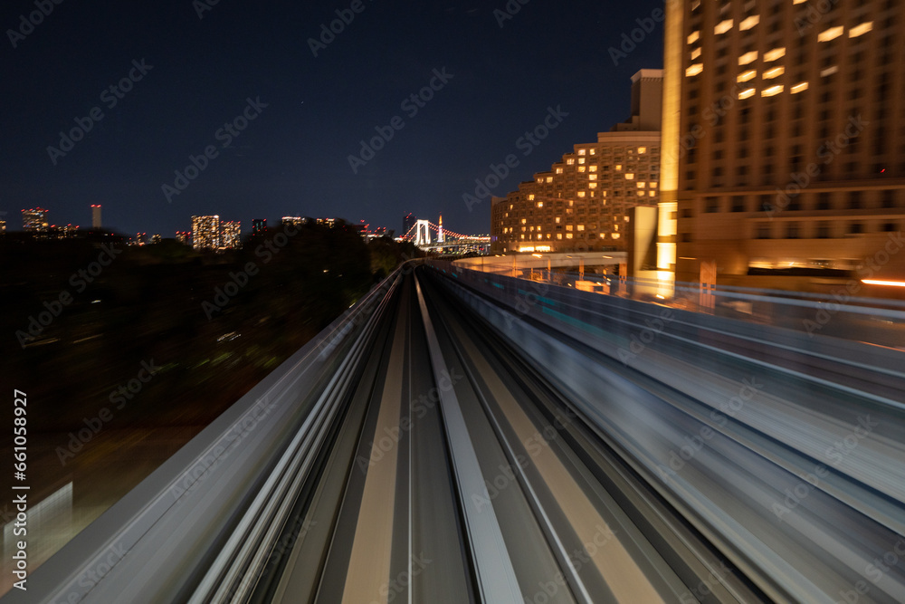 Fototapeta premium Motion blurred of train moving inside tunnel with daylight in tokyo, Japan.