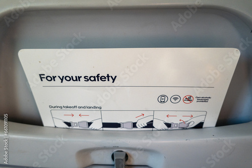 Stockholm, Sweden A safety brochure in the seat pocket of a commercial airliner. photo