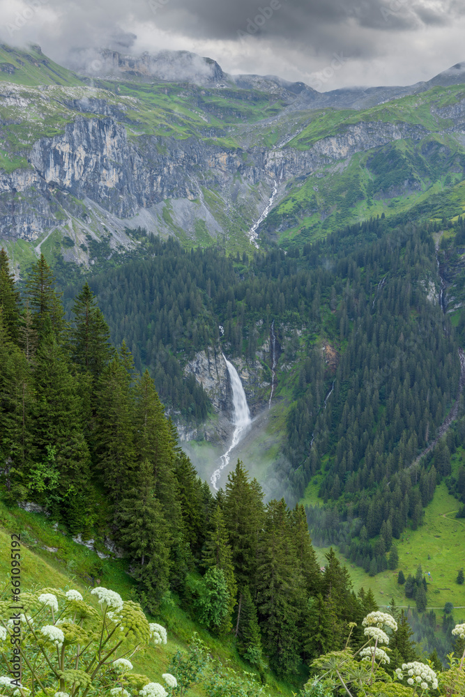 Typical alpine landscape with waterfalls (Niemerstafelbachfall), Swiss Alps near Klausenstrasse, Spiringen, Canton of Uri, Switzerland