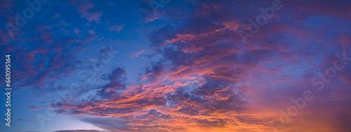 ..aerial panorama view amazing cloud with purple shadow in blue sky during beautiful sunset..Gradient color. abstract nature background..Scene of colorful orange light trough in the sky background. photo