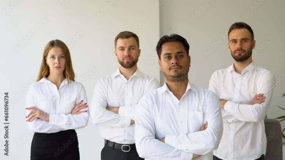 Group of business people with Indian businessman leader on foreground Group of business people with Indian businessman leader on foreground
