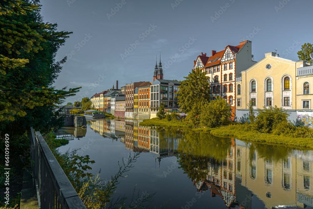 Naklejka premium Tenement houses on the Młynowka canal in Opole, Poland.