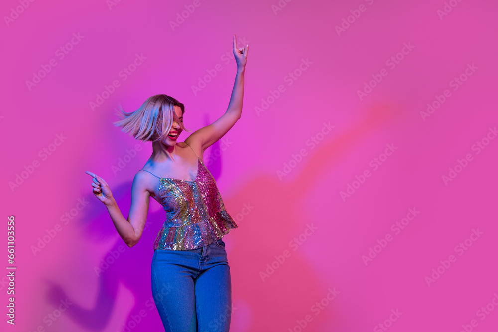 Photo of lady youngster feel funny funky dancing night club event advertising isolated neon vivid color background