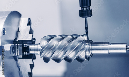 Auto CNC turning with robot drill milling factory with water coolant streams. Concept banner metal machine industry background.