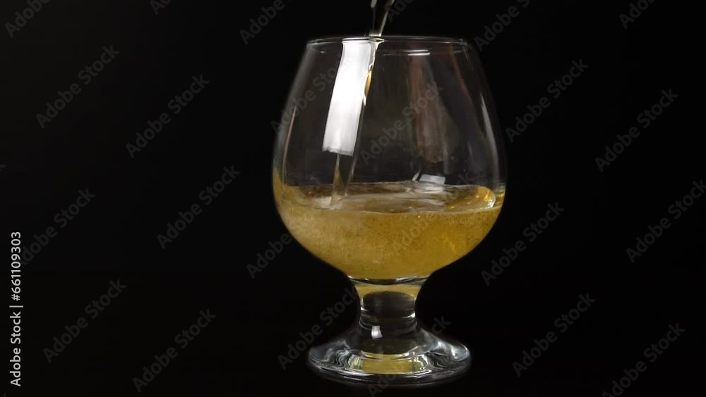 Beer Pouring into Glass. Slow Motion Video. Beer Pouring into Glass. Slow Motion Video.
