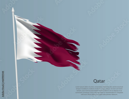 Ragged national flag of Qatar. Wavy torn fabric on blue background
