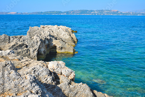 View of the wild rocky beach on Kefalonia, the largest of the Ionian island, Greece, Europe. Concept of tourism and travel.